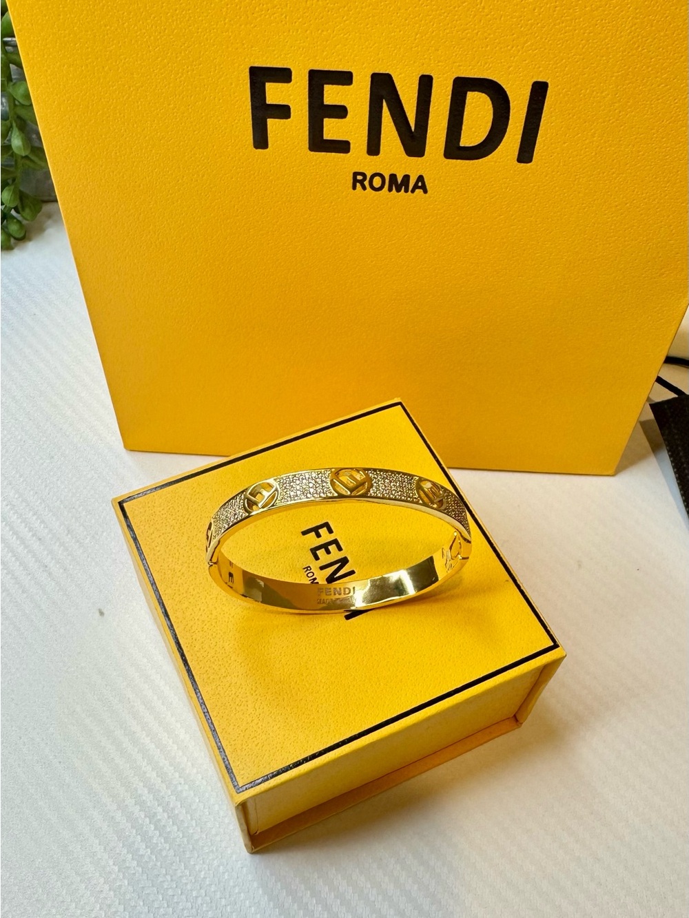 Fendi Gold-Tone Logo Sparkle Bangle Bracelet - Picture 2 of 5